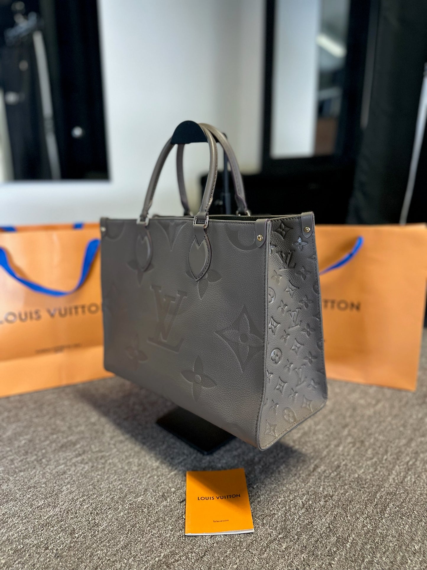 Bolsa LV OnTheGo - Couro Monogram Empreinte